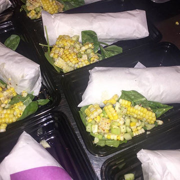 Roasted chicken wrap with avocado roasted tomato and siracha aioli w fresh corn and cucumber salad - Nourish NB